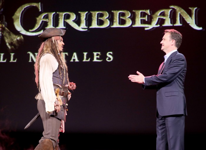 ANAHEIM, CA - AUGUST 15:  Actor Johnny Depp,  dressed as Captain Jack Sparrow, of PIRATES OF THE CARIBBEAN: DEAD MEN TELL NO TALES (L) and President of Walt Disney Studios Motion Picture Production Sean Bailey took part today in "Worlds, Galaxies, and Universes: Live Action at The Walt Disney Studios" presentation at Disney's D23 EXPO 2015 in Anaheim, Calif.  (Photo by Jesse Grant/Getty Images for Disney) *** Local Caption *** Johnny Depp; Sean Bailey