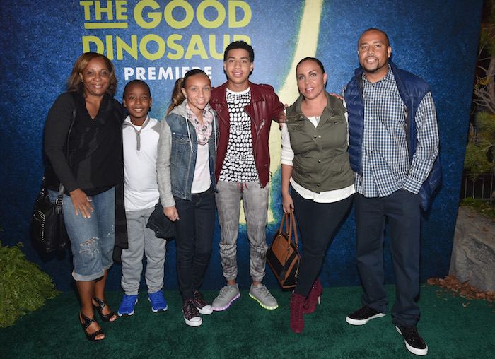 HOLLYWOOD, CA - NOVEMBER 17: Actor Marcus Scribner (center) and family attend the World Premiere Of Disney-Pixar's THE GOOD DINOSAUR at the El Capitan Theatre on November 17, 2015 in Hollywood, California. (Photo by Alberto E. Rodriguez/Getty Images for Disney) *** Local Caption *** Marcus Scribner