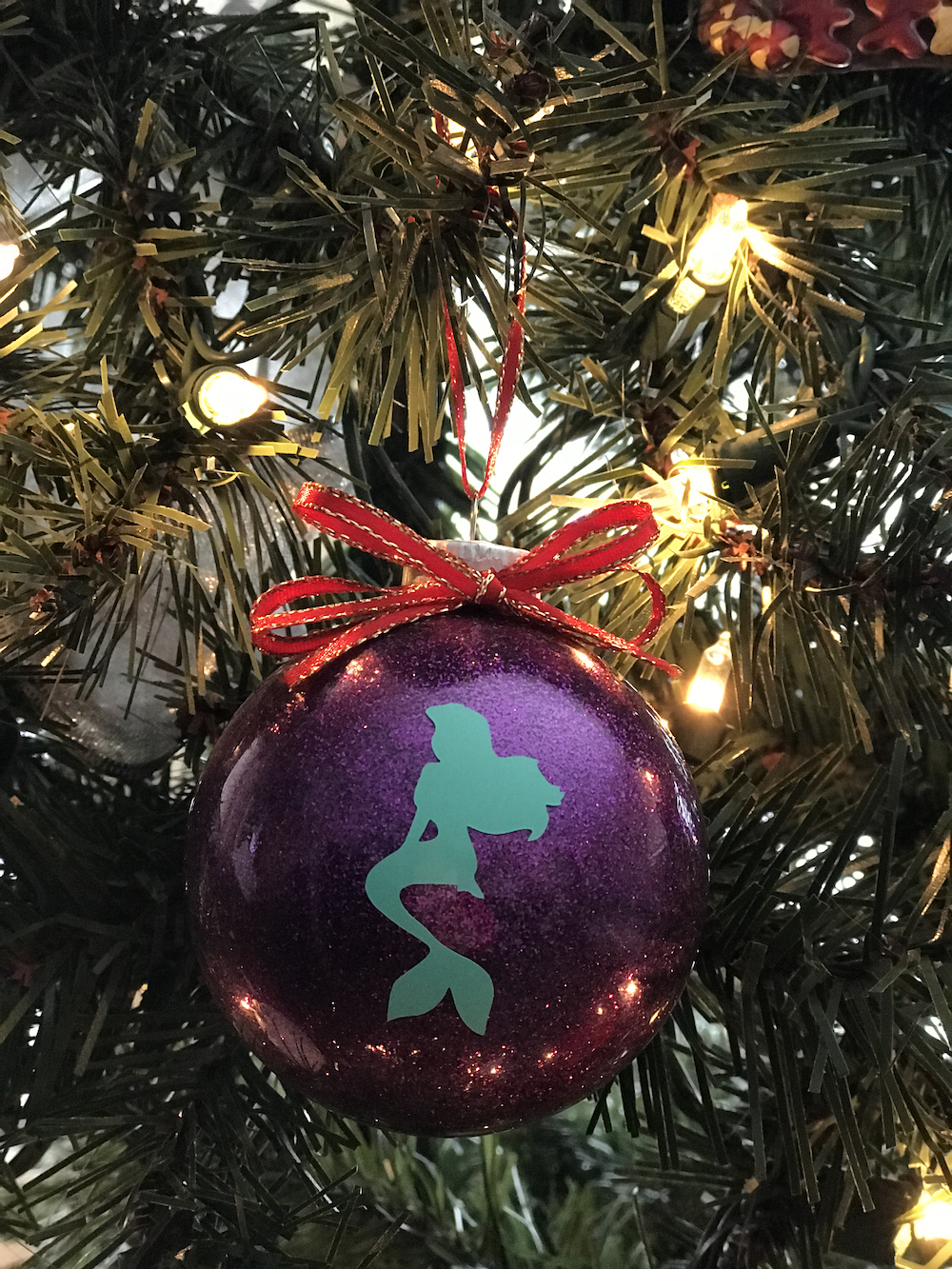 The Little Mermaid ornament is next in my ornament series. You can easily make this DIY Princess Ornament yourself with this free cut file and tutorial.