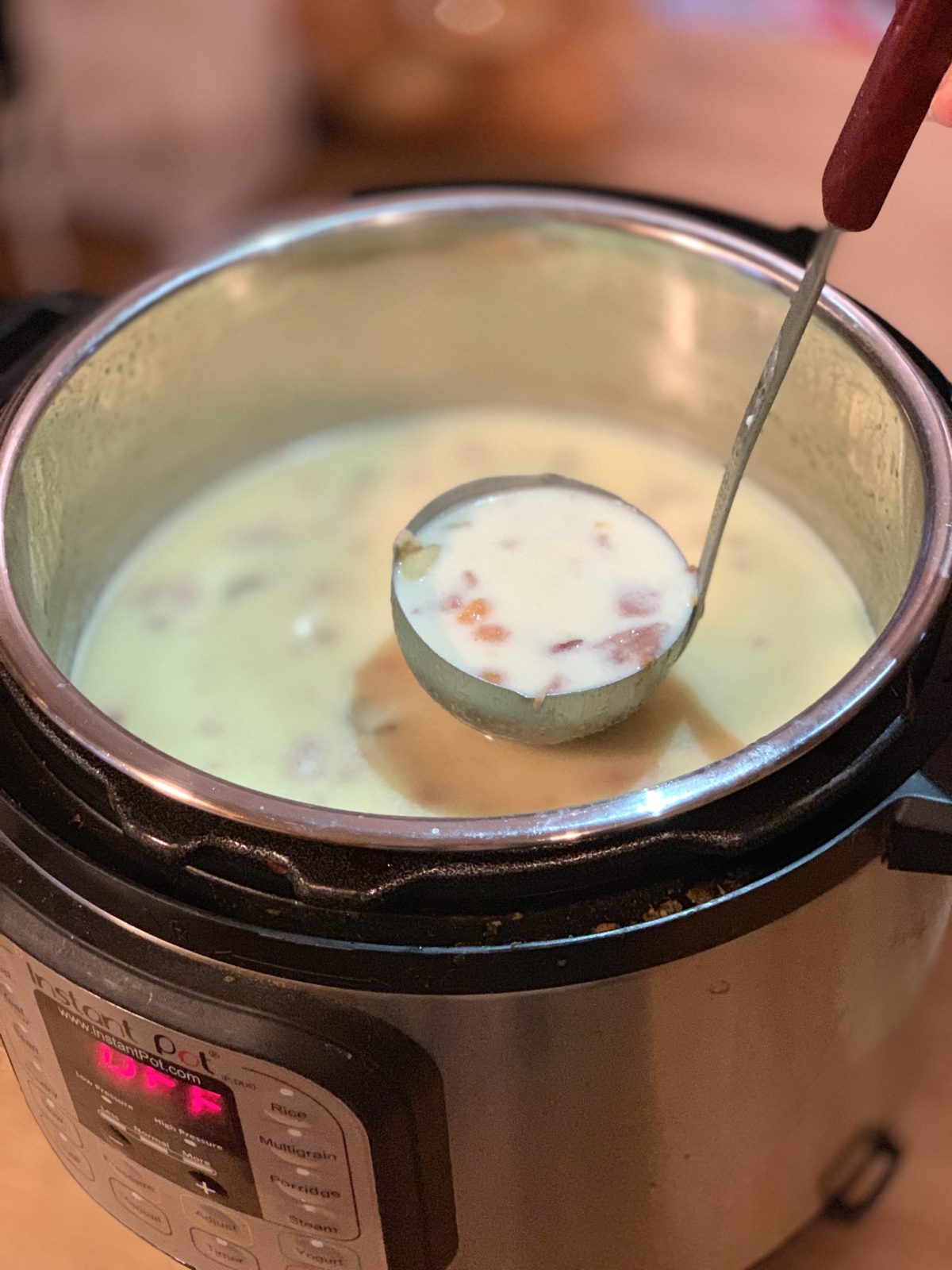 This instant pot creamy ham bone soup is so easy to make and delicious. It's hearty and can be customized to your family. 