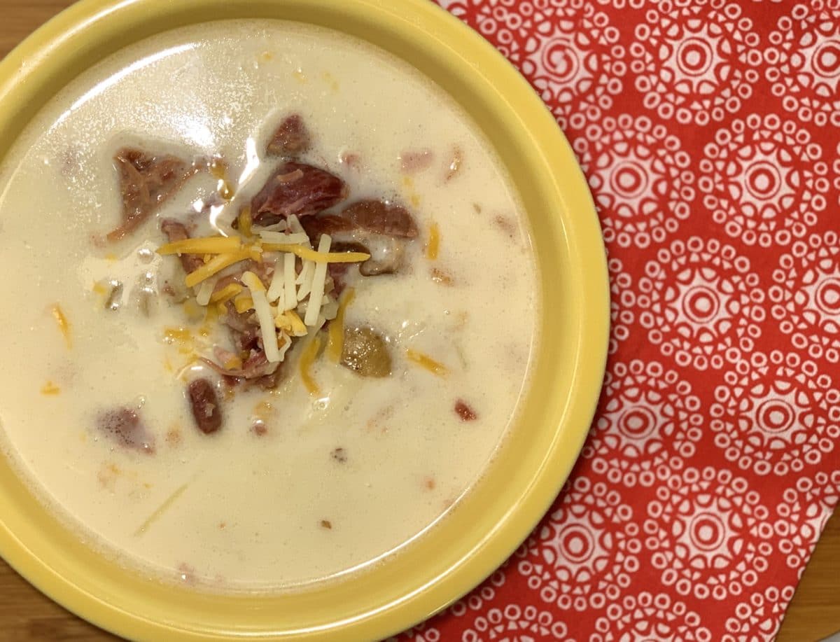This instant pot creamy ham bone soup is so easy to make and delicious. It's hearty and can be customized to your family. 