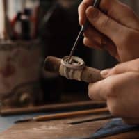 Hands of a Person Holding Jewelry Making Tools