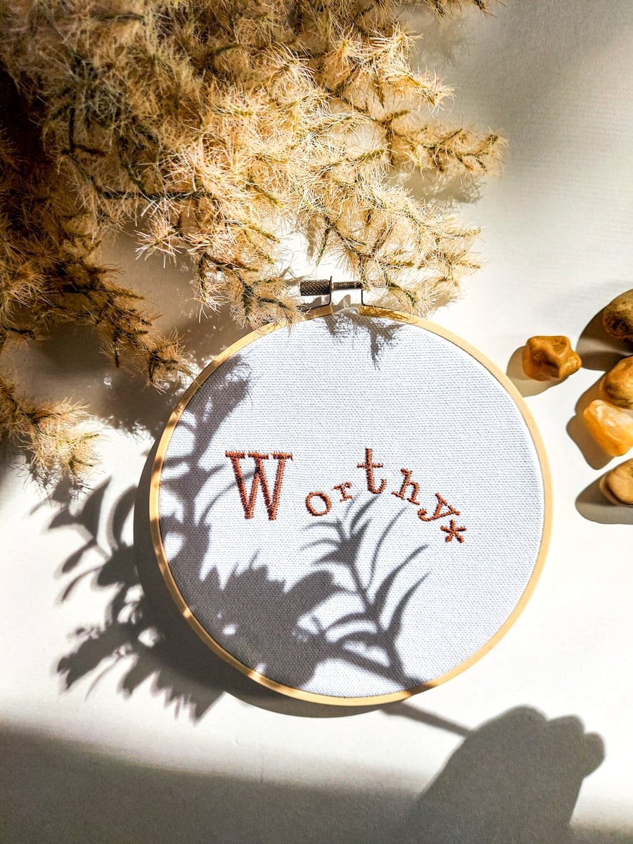 a picture of a cross stitch with words written on it