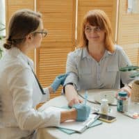 healthcare worker with patient